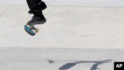 Micky Papa of Canada competes in a Street Skateboarding World Championships final, a qualifying event for Tokyo Olympic Games, in Rome, Sunday, June 6, 2021. (AP Photo/Alessandra Tarantino)