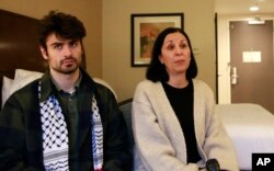 FILE - Tamara Tamimi and her son, Kinnan Abdalhamid, 20, speak about the November 25, 2023, shooting that injured Kinnan and his two friends during an interview on December 2023, in Burlington Vermont.