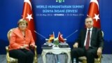 Chanceliere w'Ubudagi, Angela Merkel (i bubamfu), na Prezida Recep Tayyip Erdogan wa Turukiya (i buryo).