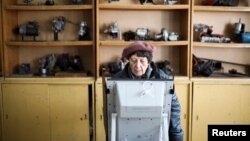 A person votes during the parliamentary election, in Sofia, Bulgaria, April 2, 2023.