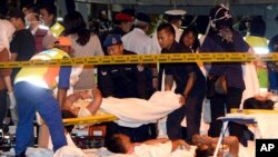 Survivors of a sank boat receive medical assistance at the Malaysia Marine Operation Force post in Kota Kinabalu, Sabah, Malaysia, Jan. 30, 2017.