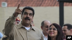 El presidente Nicolás Maduro y su esposa Cilia Flores en Puerto Ordaz, Venezuela. Agosto 11, 2016.