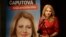 FILE - Presidential candidate Zuzana Caputova addresses the media following the first round of presidential elections, in Bratislava, Slovakia, March 16, 2019. The poster reads "Caputova is my president."