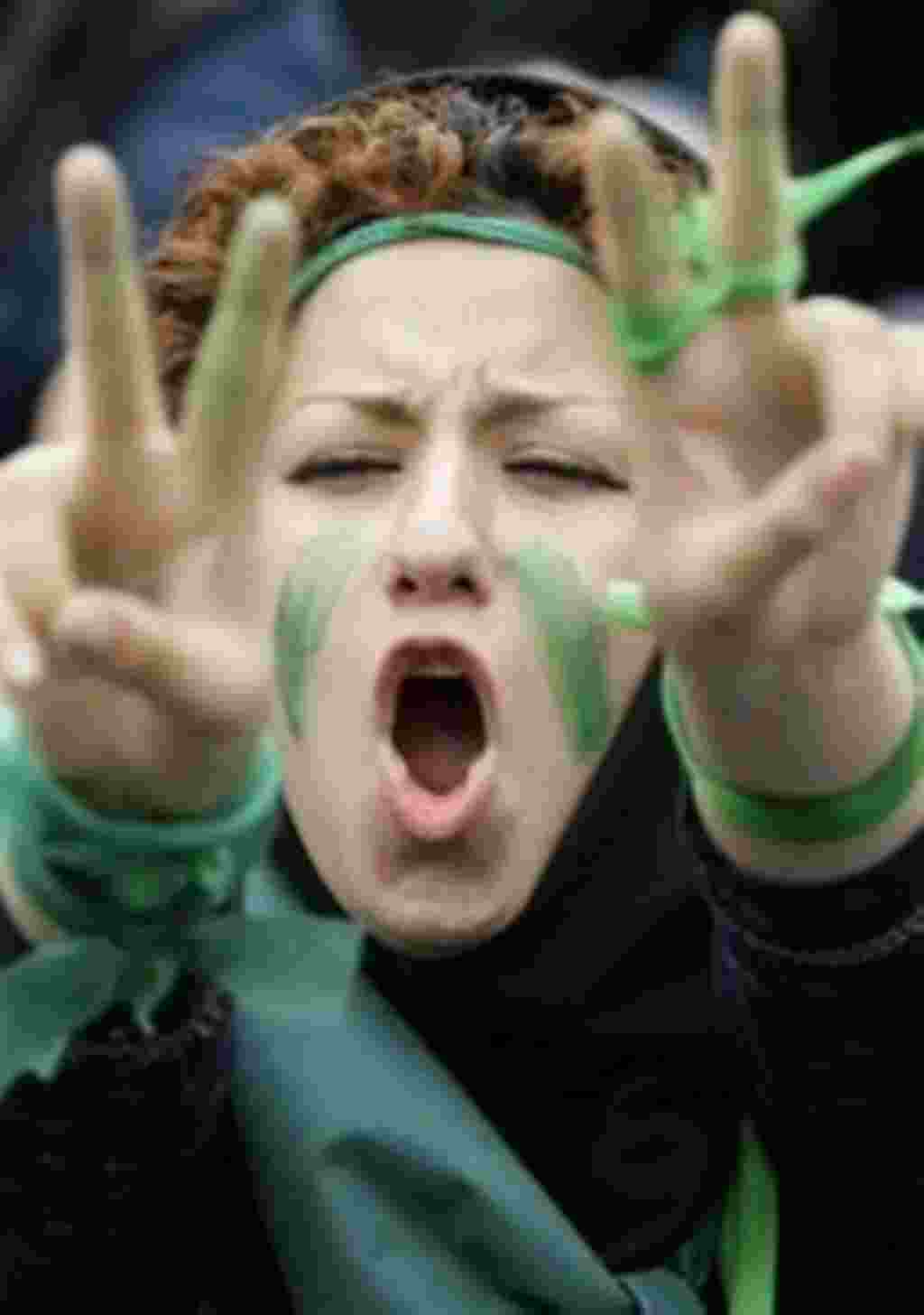 A supporter of reformist candidate, Mir Hussein Mousavi chants pro reform slogans at the Heidarnia stadium in Tehran, Tuesday, June 9, 2009. (AP Photo/Kamran Jebreili)