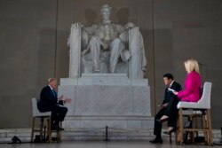 President Donald Trump speaks during a Fox News virtual town hall from the Lincoln Memorial, May 3, 2020, in Washington.