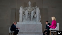 President Donald Trump speaks during a Fox News virtual town hall from the Lincoln Memorial, May 3, 2020, in Washington.