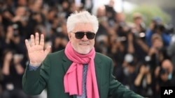 Director Pedro Almodovar poses for photographers at the photo call for the film 'Pain and Glory' at the 72nd international film festival, Cannes, southern France,, May 18, 2019. 