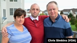 Josh Bell, flanked by his parents, Margaret and Delegate John Bell, in Loudoun County, Va., Nov. 6, 2017, is a recovering opioid addict. He credits his recovery to his family’s unfailing love and support. 