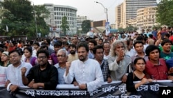 Bangladeshi activists and students shout slogans demanding arrest of three motorcycle-riding assailants who hacked and shot student activist Nazimuddin Samad to death as he walked with a friend, in Dhaka, Bangladesh, April 8, 2016.