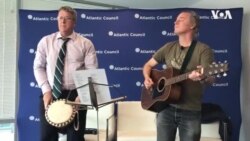 South African Author Greg Mills Performs With Singer Robin Auld in Washington DC