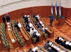 FILE - The members of the Uzbekistan Senate are seen during their session in Tashkent, Aug. 26, 2005.