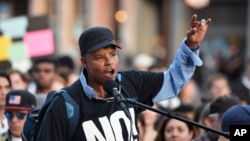 Xothitl Johnson addresses a crowd of protesters before a speaking engagement by Ben Shapiro on the campus of the University of California, Berkeley in Berkeley, Calif., Sept. 14, 2017.