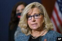 Rep. Liz Cheney, R-Wyo., the House Republican Conference chair, speaks with reporters following a GOP strategy session on Capitol Hill in Washington, April 20, 2021.