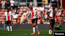 FILE: Premier League - Southampton v Fulham - St Mary's Stadium, Southampton, Britain - May 13, 2023 Southampton's Carlos Alcaraz and Romeo Lavia react Action Images via Reuters.