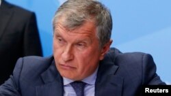 FILE - Rosneft CEO Igor Sechin at the St. Petersburg International Economic Forum 2014 in St. Petersburg, May 24, 2014.