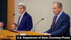FILE - U.S. Secretary of State John Kerry (L), speaks as he and Russian Foreign Minister Sergei Lavrov address reporters during a joint news conference following talks on Syria in Geneva, Aug. 26, 2016.