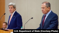 FILE - U.S. Secretary of State John Kerry, left, and Russian Foreign Minister Sergei Lavrov address reporters following a meeting focused on the Syrian civil war, in Geneva, Aug. 26, 2016.