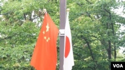 中國總理李克強訪日令東京街頭8年來重現日中國旗。