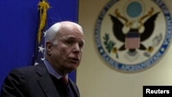 U.S. Senator John McCain speaks during a news conference at the U.S. embassy in Kabul, Afghanistan, Jan. 2, 2014.