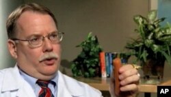 Dr. Gary Smith heads the Center for Injury Research and Policy at Nationwide Children's Hospital in Columbus, Ohio. He and other pediatricians are calling for warning labels on foods that are a high-risk for choking for children.