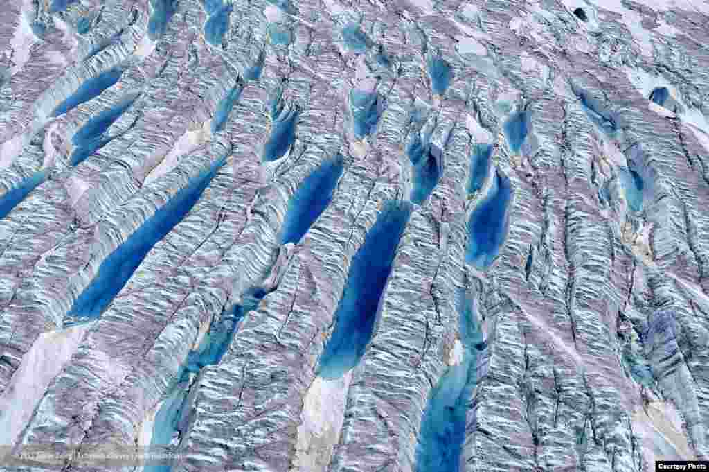 Aerial view of meltwater on the Greenland Ice Sheet. (James Balog/Extreme Ice Survey)