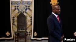 FILE - Guinea-Bissau President Jose Mario Vaz arrives to speak at the presidential palace in Lisbon, Spain. 