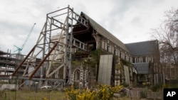 The ChristChurch Cathedral remains in ruins in Christchurch, New Zealand, Sept. 5, 2017, following a Feb. 22, 2011, earthquake. On Saturday, the Anglican church made a decision to rebuild the cathedral, strengthening it for future quakes and adding improvements but otherwise leaving the basic design intact.