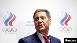 FILE - Russian Olympic Committee head Alexander Zhukov leaves a meeting about the Russian athletics team and federation held by the executive committee of the Russian Olympic Committee in Moscow, Russia, Nov. 18, 2015.