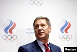 FILE - Russian Olympic Committee head Alexander Zhukov leaves a meeting about the Russian athletics team and federation held by the executive committee of the Russian Olympic Committee in Moscow, Russia, Nov. 18, 2015.