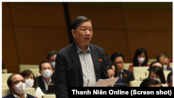 Bộ trưởng Công an Tô Lâm trả lời chất vấn tại Quốc hội ở Hà Nội hôm 10/11/2021. Ông Lâm, cùng chánh án TANDTC Nguyễn Hoà Bình, bị 10 tổ chức quốc tế đề nghị đưa vào danh sách trừng phạt theo luật Magnitsky toàn cầu.