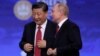 Changing the Constitution to Keep Power, Putin Follows Xi 