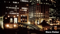 Chicago "L" elevated train crosses Chicago River on the Wells Street Bridge, approaching Merchandise Mart station.