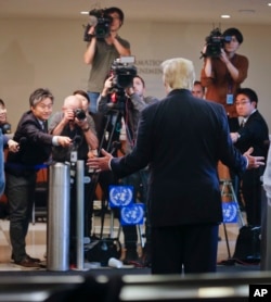 President Donald Trump makes a brief statement to the media while at U.N. headquarters in New York, Sept. 18, 2017.