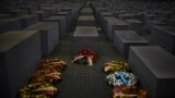 Wreaths are placed at the Memorial to the Murdered Jews of Europe on the International Holocaust Remembrance Day in Berlin, Germany.