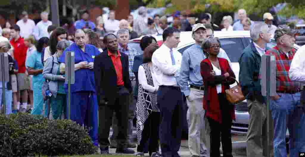 Several hundred people wait in line to vote early in the morning in Ridgeland, Mississippi.