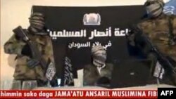 FILE - An image grabbed on December 24, 2012, a video released by Jama'atu Ansarul Muslimina fi Biladis Sudan, the radical Islamist group known as Ansaru, reportedly shows unidentified members of the group speaking in an undisclosed place in November 2012.