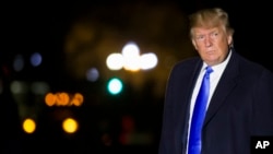 FILE - President Donald Trump walks on the South Lawn of the White House after stepping off Marine One in Washington, April 6, 2019. 