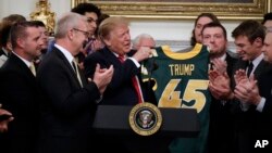President Donald Trump welcomes 2018 NCAA FCS College Football Champions, The North Dakota State Bison, to the White House in Washington, March 4, 2019. 