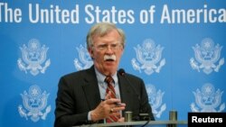 U.S. President Donald Trump's national security adviser, John Bolton, speaks at a news conference in Kyiv, Ukraine, Aug. 24, 2018.