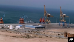 FILE - A Pakistan Navy ship berths at Gwadar port, Pakistan, April 11, 2016. The facility is seen as central to a multi-billion dollar economic cooperation agreement between Pakistan and China.