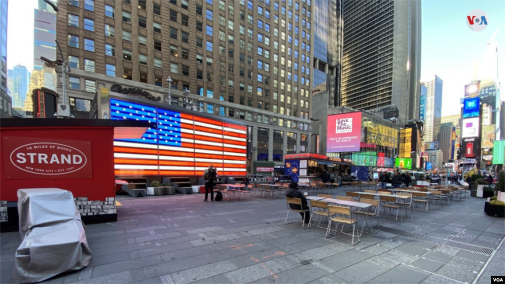 Times Square in New York with just a few people around due to the threat of coronavirus. (Photo: Ronen Suarc)