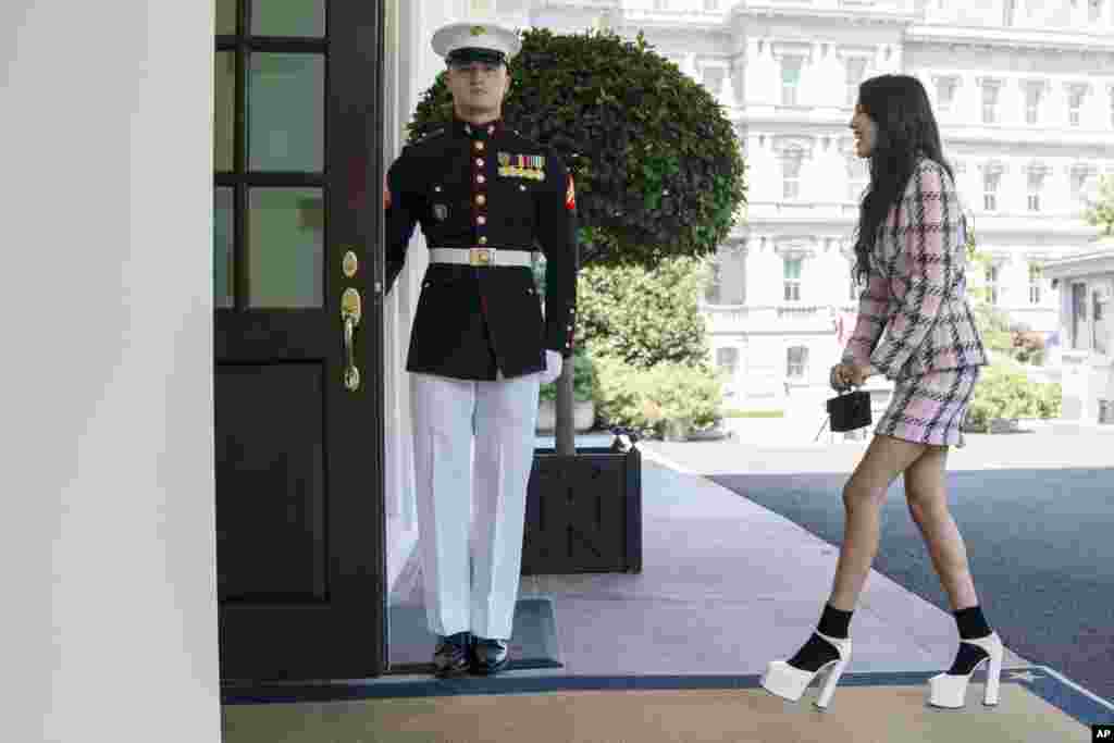 Singer Olivia Rodrigo arrives at the White House to promote the COVID-19 vaccine, in Washington.