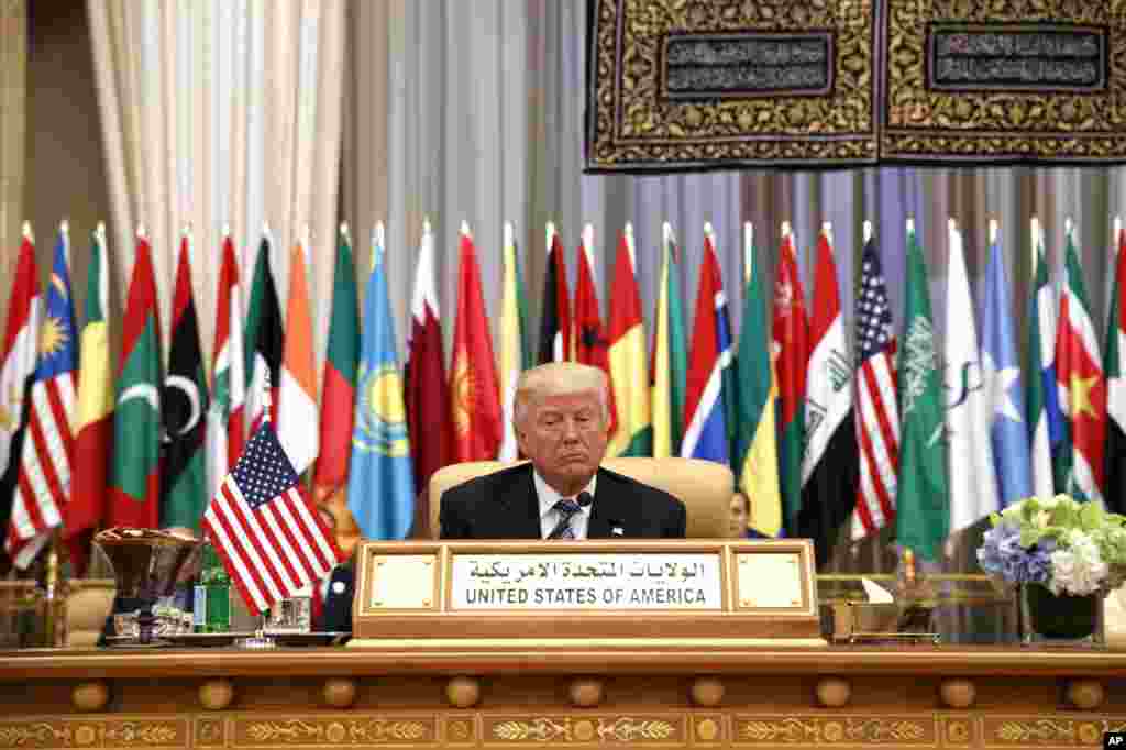 President Donald Trump waits to deliver a speech to the Arab Islamic American Summit, at the King Abdulaziz Conference Center, Sunday, May 21, 2017, in Riyadh, Saudi Arabia.