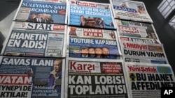 FILE - Turkish newspapers carry the news of the blocking of YouTube after an audio recording of a government security meeting was leaked on the video-sharing website., March 24, 2014.