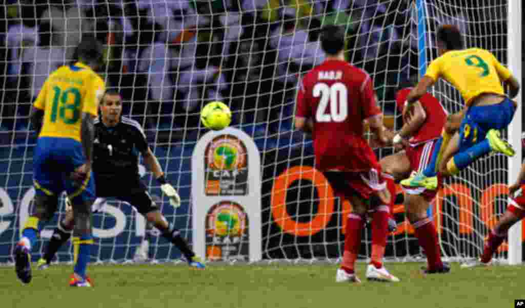 Gabon's Emerick shoots to score against Morocco during their African Cup of Nations soccer match in Libreville