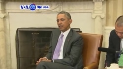 VOA60 America - President Obama signs the Trans-Pacific Partnership - October 6, 2015