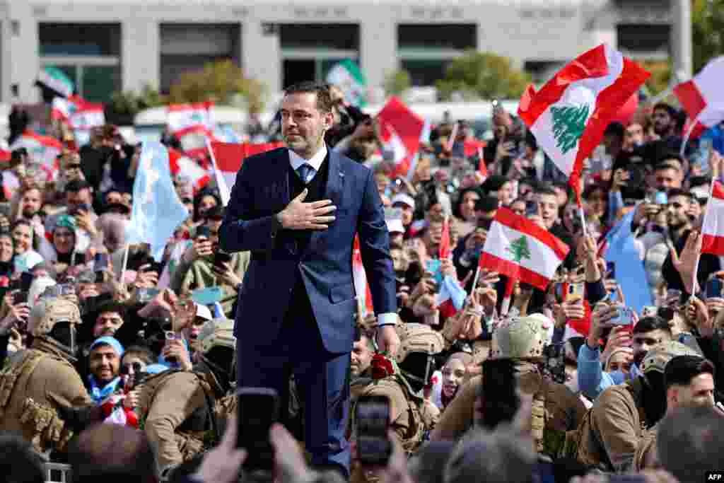 Saad Hariri, former Lebanese prime minister and the son of late premier Rafic Hariri, greets his supporters as he arrives to deliver a speech to mark 20 years since the assassination of his father, in Beirut&#39;s Martyrs&#39; Square.