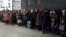 Pensioners stand in a queue to get a financial aid at one of the government offices of the self-proclaimed Donetsk People's Republic in Donetsk, eastern Ukraine, Dec. 12, 2014. 
