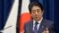 Japanese Prime Minister Shinzo Abe speaks to the media on the eve of the fifth anniversary of the March 11, 2011, earthquake and tsunami, in Tokyo, March 10, 2016. He pledged to bolster reconstruction efforts in northern Japan.