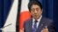 Japanese Prime Minister Shinzo Abe speaks to the media on the eve of the fifth anniversary of the March 11, 2011, earthquake and tsunami, in Tokyo, March 10, 2016. He pledged to bolster reconstruction efforts in northern Japan.